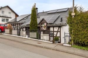 a house with solar panels on the roof at Haus Stanek in Willingen