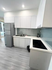 Η κουζίνα ή μικρή κουζίνα στο Sora House 9 - The most luxurious apartment in OCP