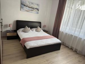 Ένα ή περισσότερα κρεβάτια σε δωμάτιο στο Nicos Studio