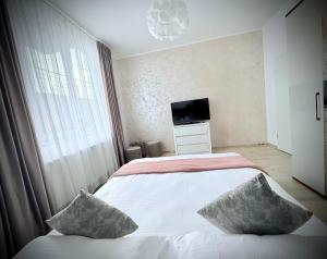 Ένα ή περισσότερα κρεβάτια σε δωμάτιο στο Nicos Studio +24 φωτογραφίες