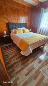 Voodi või voodid majutusasutuse Cabaña Panguipulli - Sector Altos de Palguin toas