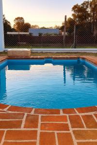 Bazén v ubytování Rincon de Tucuns nebo v jeho okolí