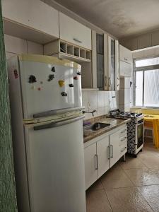 Køkken eller tekøkken på Edifício Açucena Beira Mar - Praia do Tombo