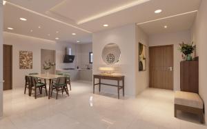 a kitchen and dining room with a table and chairs at Hotel Apartment Majestic Manor Dakar Diamniadio in Rufisque