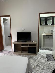 TV a/nebo společenská místnost v ubytování Estação 48
