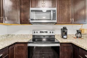 Kuchyň nebo kuchyňský kout v ubytování 5218 Beach Dr A