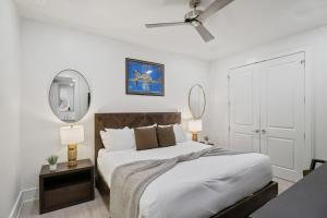 Postel nebo postele na pokoji v ubytování The Theodore New Orleans