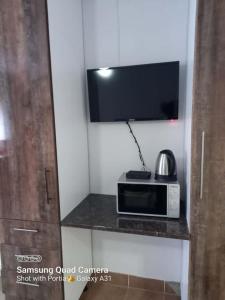 Kuchyň nebo kuchyňský kout v ubytování Mthembu Executive Accomodation