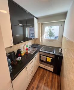 Η κουζίνα ή μικρή κουζίνα στο Perle Apartment