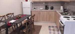 Η κουζίνα ή μικρή κουζίνα στο Αρσινόη apartments 3