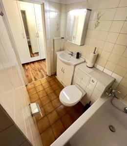 Ένα μπάνιο στο Perle Apartment +8 φωτογραφίες