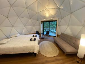 Ένα ή περισσότερα κρεβάτια σε δωμάτιο στο HuellaBlanca +14 φωτογραφίες