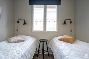 Postel nebo postele na pokoji v ubytování Holiday in Lapland - Postintie 3 A 6103 + 2 fotografie