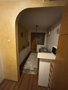 Kuchyň nebo kuchyňský kout v ubytování Apartament 2 camere