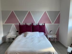 Ένα ή περισσότερα κρεβάτια σε δωμάτιο στο Il Nocciolo