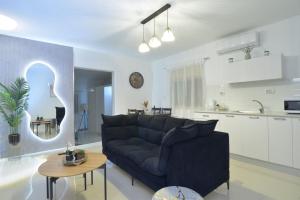 Kuchyň nebo kuchyňský kout v ubytování פינוק של סוויטה