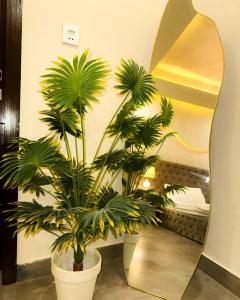 Ένα ή περισσότερα κρεβάτια σε δωμάτιο στο 2BHK Fusion Loft - Jaccuzi - Cinema - PS4