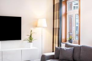 Μια τηλεόραση ή/και κέντρο ψυχαγωγίας στο Ferienwohnung am Dom in Erfurt