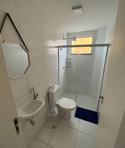 Et badeværelse på Apartamento Térreo em Resort