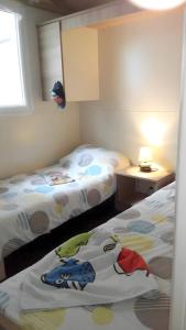 Postel nebo postele na pokoji v ubytování Samoa