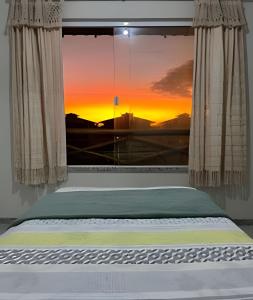 En eller flere senge i et værelse på Apartamento em Condomínio Resort + 45 billeder