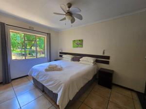 Giường trong phòng chung tại Hills and Dales Accommodation +96 ảnh