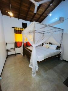 Ένα ή περισσότερα κρεβάτια σε δωμάτιο στο Sunil villa