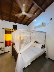 Ένα ή περισσότερα κρεβάτια σε δωμάτιο στο Sunil villa