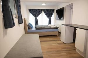 Postel nebo postele na pokoji v ubytování Novo