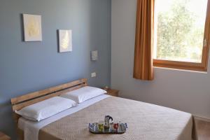 Postel nebo postele na pokoji v ubytování Agriturismo Fioralba + 110 fotografií