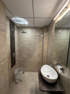 Phòng tắm tại Hotel Sanidhyam Bliss +20 ảnh