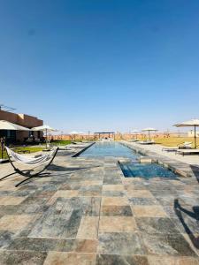 Bazén v ubytování Somptueuse Villa avec Terrains Padel et Foot Piscine Marrakech nebo v jeho okolí