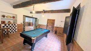 a billiard room with a pool table in it at Villa Mona Private pool and barbecue in Malaga in Málaga