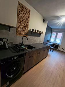 Η κουζίνα ή μικρή κουζίνα στο Wrocławska 7