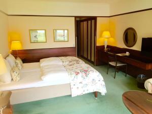 Katil atau katil-katil dalam bilik di Hotel Hesselet