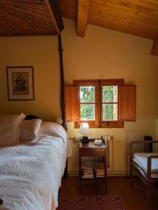 Postel nebo postele na pokoji v ubytování Celler Colltor + 15 fotografií