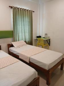 Ένα ή περισσότερα κρεβάτια σε δωμάτιο στο Spring Valley Hotels