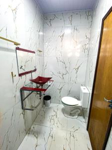 Ένα μπάνιο στο Suíte no cidade Jardim +6 φωτογραφίες