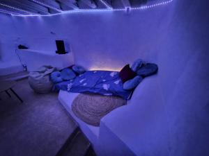 Ένα ή περισσότερα κρεβάτια σε δωμάτιο στο Cortijo el Galardón