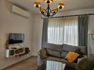 TV a/nebo společenská místnost v ubytování Los Pinos Mar y Montaña