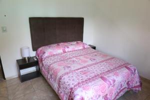 Postel nebo postele na pokoji v ubytování Cabañas Ernestina + 20 fotografií