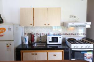 Kuchyň nebo kuchyňský kout v ubytování Cabañas Ernestina