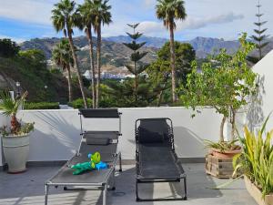 Nespecifikovaný výhled na hory nebo výhled na hory při pohledu z prázdninového domu