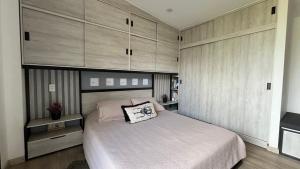 Postel nebo postele na pokoji v ubytování Mini loft moderno