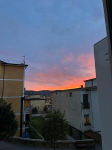 a sunset view of a city with buildings at A casa di Rita in Agropoli