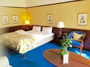 Katil atau katil-katil dalam bilik di Hotel Hesselet