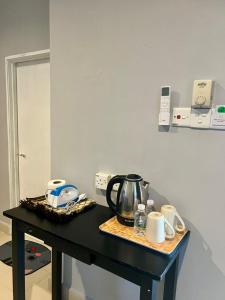 Příslušenství pro přípravu čaje a kávy v ubytování Elysia Resort Langkawi