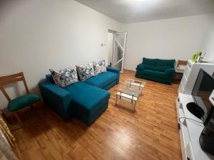 TV a/nebo společenská místnost v ubytování Alex