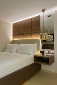 Ένα ή περισσότερα κρεβάτια σε δωμάτιο στο One Apartments Provenza