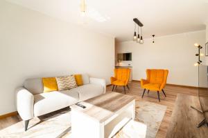 Posezení v ubytování GuestReady- Charming Condo with Pool in Caniço